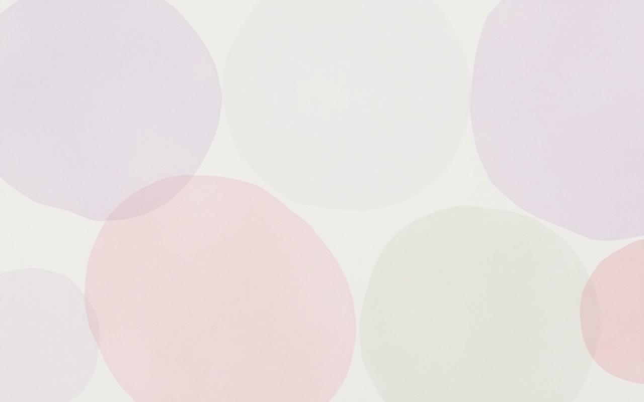 Soft watercolor circles in lavender, sage, and rose representing scattered focus and calm